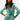 A female model wearing a green metallic foil print linen shirt with a V-neckline and a belt.