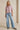 Lad Shirt pink shirt and jeans full-body view showing easy everyday fit.
