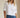 Lad Shirt white relaxed-fit button-down styled with blue jeans front view on model.