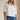 Lad Shirt white relaxed-fit button-down styled with blue jeans front view on model.