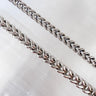 Silver stainless steel chain bracelet on neutral background — Lava Bracelet by Matte.