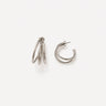 Liége Hoop Earrings featuring polished silver-plated multi-band hoop earrings with layered rounded curves, smooth mirror finish, secure hinged closure, lightweight design, and bold contemporary style, displayed on a soft white background.