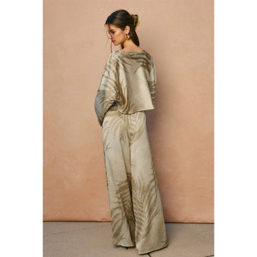 Lich Pant palm print wide-leg trousers back view showing flowy silhouette.