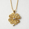 Lucky Necklace close-up product view showing crystal clover charm detail.