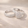 Lumi Stack Ring pavé cluster ring with round center design and a band ring with shimmering stones in silver finish statement stacking ring on neutral background