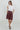 Maratea Blouse worn by model, full body view, styled with high-waist pants for an elevated look.