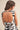 Marvin Dress zebra print mini dress close-up back clasp detail and tied bow.