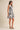 Marvin Dress zebra print mini dress side view showing flowy A-line skirt