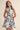 Marvin Dress zebra print mini dress front view with flattering high neckline