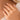 Woman wearing the Mercedes Ring by Matte, a delicate gold beaded stretch ring with polished mirror-finish beads, styled on hand with soft natural lighting.