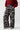 Front view of metallic floral wide leg trousers in silver with purple and green blooms, styled with red sweater