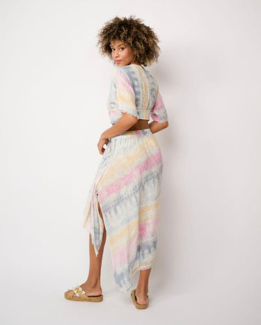 Back view of Matte’s Mirage Crop Top showing soft pastel hues and textured resort fabric.