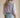 Mirko Blouse soft lavender blouse back view showing embroidered sleeve detail.