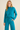 Model wearing turquoise knit lounge sweater set with drawstring pants — Matte.
