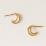 Moon Stud Earrings — gold-plated crescent-shaped earrings with smooth mirror finish on linen background, minimal and elegant by Matte.