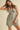 Nash Romper leopard print romper close-up front angle highlighting plunging neckline and statement button detail