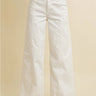 Nurcia Jeans full front view showing high-rise waist and wide-leg silhouette in clean off-white denim with relaxed straight drape