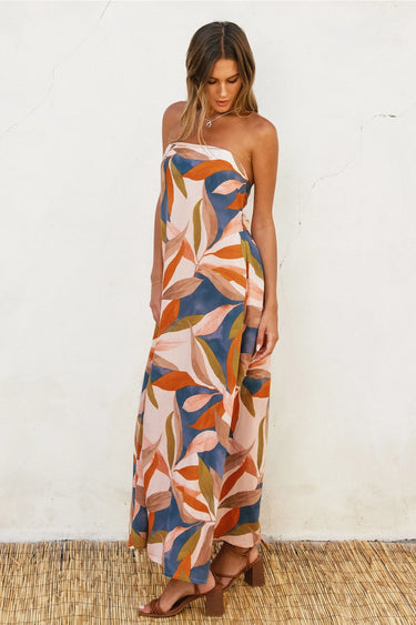 Otti Maxi Dress strapless leaf print maxi dress side view showing flowy relaxed silhouette.