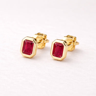 Pinda Stud Earrings fuchsia zirconia pear cut gold stud earrings.