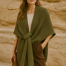 Quiton Poncho Cape — olive green ribbed knit wrap with self-tie front, shown on model, cozy fall accessory from Matte.