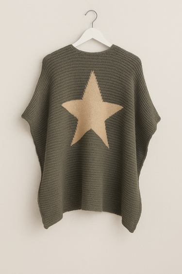 Quiton Poncho Cape — olive green ribbed knit wrap with self-tie front, shown hanging on beige wall, back view, cozy fall accessory from Matte.