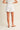 Ragit Short white tailored shorts back view highlighting clean lines and structured waistband.