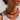 Ravn Necklace red beaded necklace worn on neck with white top, showing bold glossy beads and statement fit at neckline