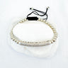 Silver beaded Sahara Bracelet with crystal pavé bar detail, displayed on white stone background