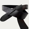 Close-up of the Scarlet Knot Belt in black, handcrafted from Argentinian leather with wrap knot design