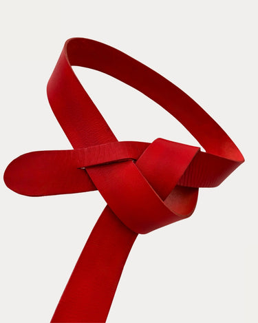 Scarlet Knot Belt in bold red color, Argentinian leather wrap belt with sculptural knot closure
