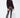Shimmering black sequin flare pants styled with a casual sweatshirt, statement night-out look by Matte