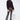 Shimmering black sequin flare pants styled with a casual sweatshirt, statement night-out look by Matte