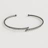 Seris Cuff Bracelet — slim open gunmetal cuff bracelet with arrow pavé detail on white background, minimalist jewelry by Matte.