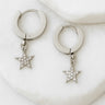 Starlight Huggie Earrings, silver plated hoops with dangling crystal star charm, celestial jewelry by Matte