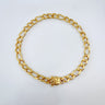 A chunky gold-filled chain necklace with a gold-tone clasp, displayed against a white background.