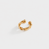 Twist & Flow Ear Cuff in polished gold featuring a twisted braided open cuff design with rounded ends, styled as a modern sculptural statement ear cuff on a soft neutral background.