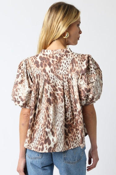 Tyrath Blouse back view showcasing relaxed silhouette, lightweight leopard print fabric, and flowy fit designed for effortless everyday wear.