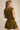 Uvek Top back view of striped sleeveless top with structured fit and vertical olive and gold stripes