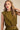 Uvek Top front view highlighting bold stripe pattern, sleeveless cut, and clean neckline design.