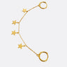 Vega Chain Huggies in gold – double huggie earrings connected by delicate chain with dangling star charms
