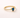 Voluspa Ring gold band with blue pear-shaped gemstone on neutral background