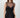 Wada Top worn by model, front view, highlighting corset-style ruching and sheer mesh detail