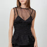 Wada Top worn by model, front view, highlighting corset-style ruching and sheer mesh detail