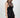 Wada Top worn by model, angled front view, highlighting corset-style ruching and sheer mesh detailing.
