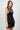 Wada Top worn by model, angled front view, highlighting corset-style ruching and sheer mesh detailing.