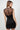 Wada Top worn by model, back view, showing sheer mesh upper and fitted silhouette.