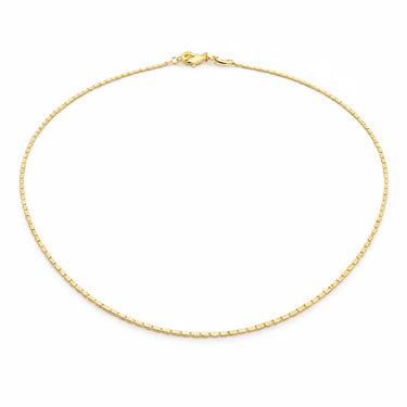 Whizat Necklace thin gold chain isolated on light background delicate layering necklace
