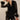 Yanz Mesh Top sheer feather-trim top styled with black pants full outfit posed.