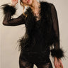Yanz Mesh Top sheer feather-trim top styled with black pants full outfit posed.