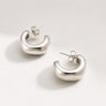 Acura Hoop Earrings featuring polished silver sculptural hoop earrings with a bold puffed crescent silhouette, smooth mirror finish, lightweight hollow design, secure post-back closure, and modern statement style.